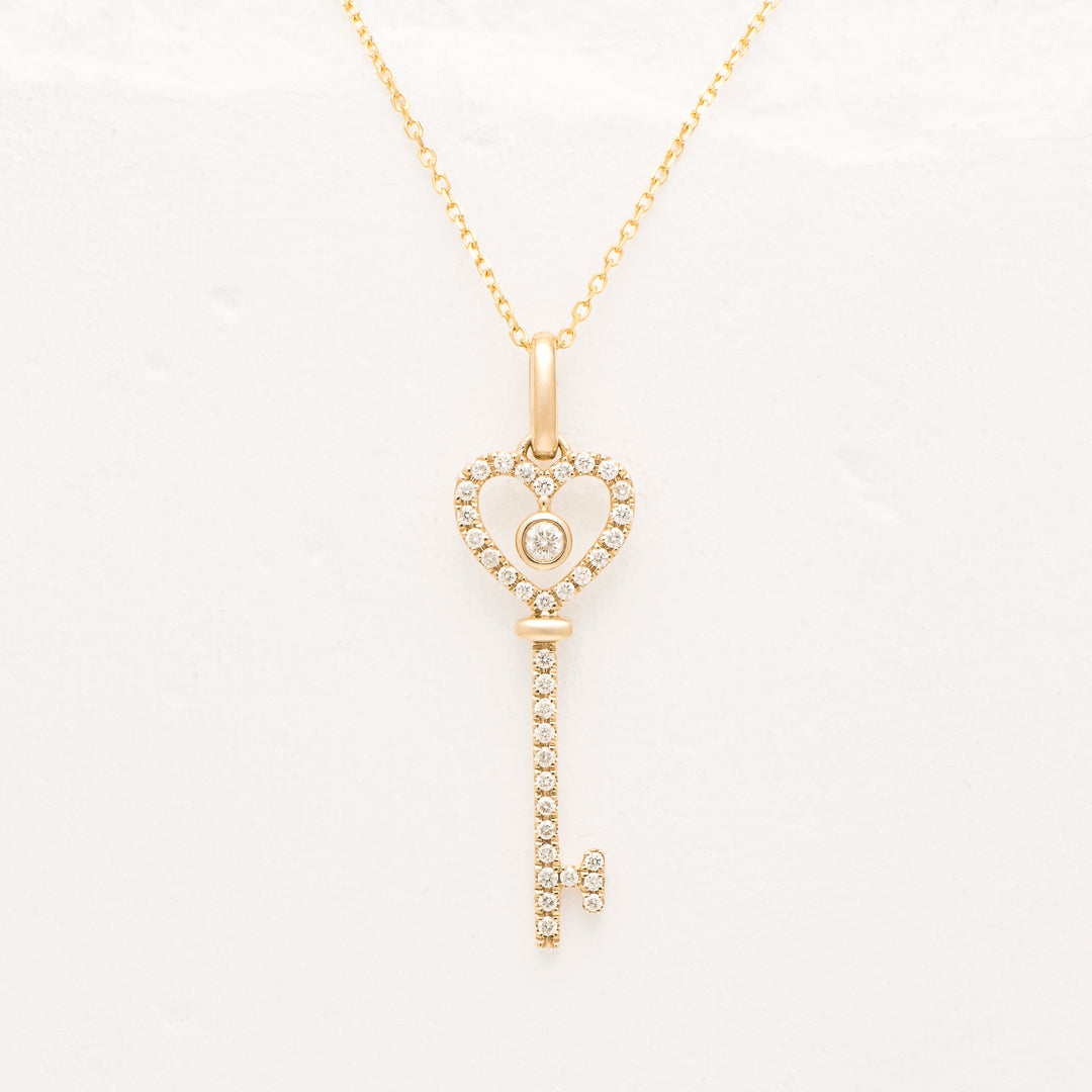 14KY .2ctw Dia. Key Pendant