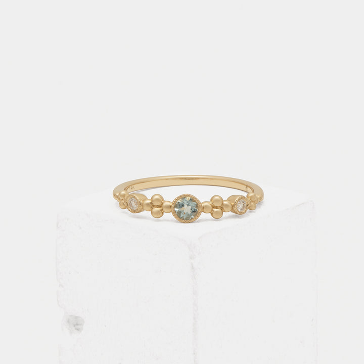 14KY .12 Rd Aquamarine & .05ct