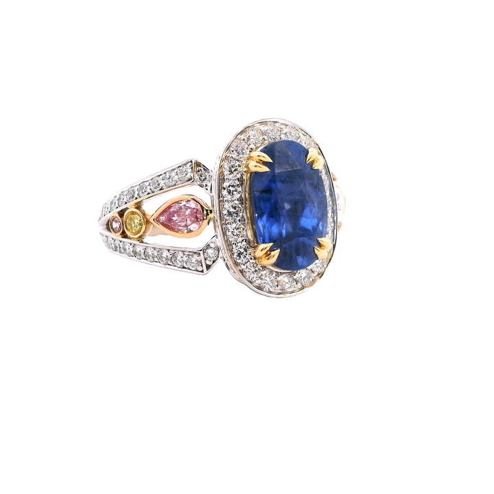 Oval Shape Blue Sapphire Halo Cocktail Ring In Tri-Color Gold