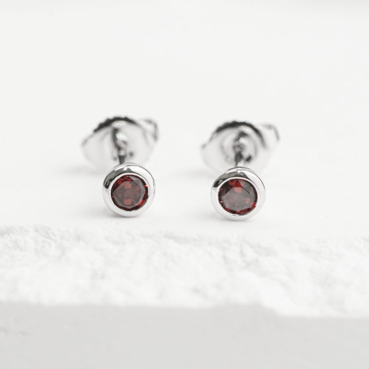 Sterling Silver Created Ruby Bezel Stud Earrings