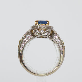 Oval Shape Blue Sapphire Halo Cocktail Ring In Tri-Color Gold