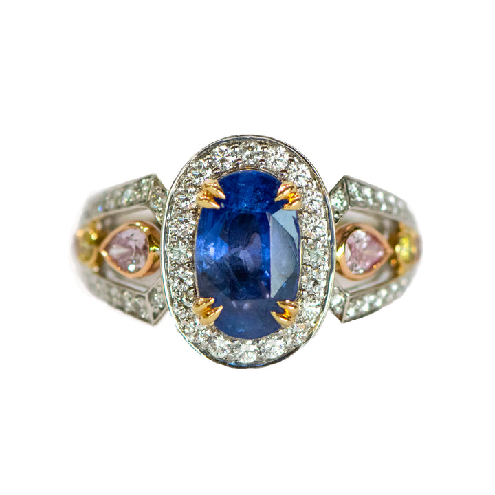 Oval Shape Blue Sapphire Halo Cocktail Ring In Tri-Color Gold