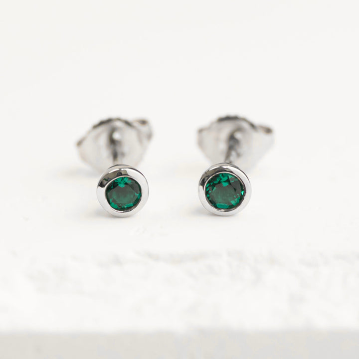 Sterling Silver Created Emerald Bezel Stud Earrings