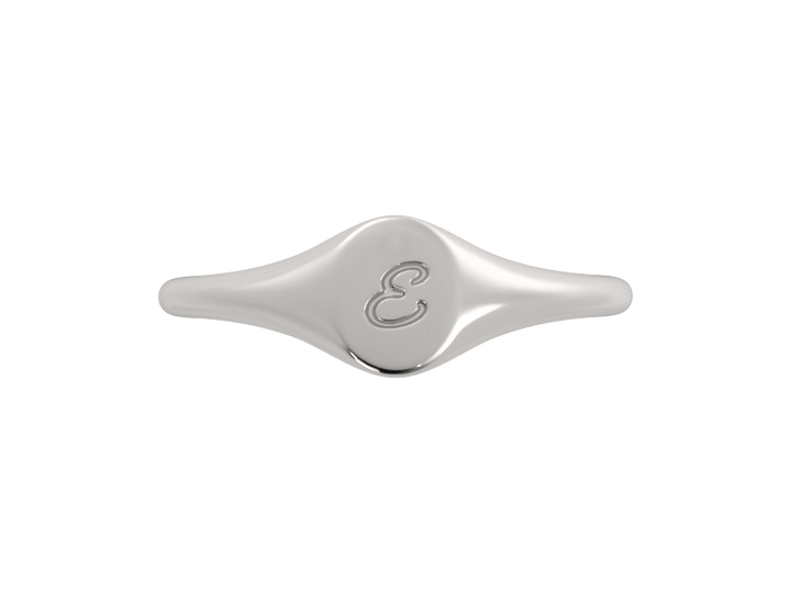 Minimalist ladies’ signet ring with custom script initial in solid gold or silver. Dainty, heirloom-quality personalized jewelry for women.