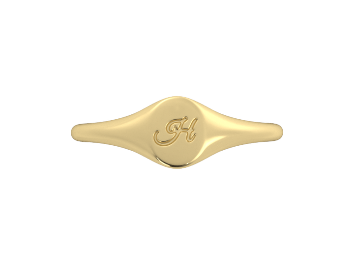 Minimalist ladies’ signet ring with custom script initial in solid 14K yellow gold. Dainty, heirloom-quality personalized jewelry for women.