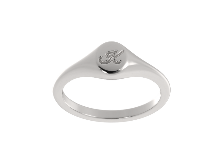 Minimalist ladies’ signet ring with custom script initial in solid gold or silver. Dainty, heirloom-quality personalized jewelry for women.