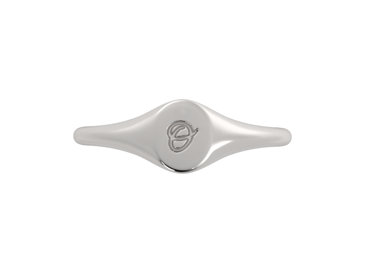 Minimalist ladies’ signet ring with custom script initial in solid gold or silver. Dainty, heirloom-quality personalized jewelry for women.