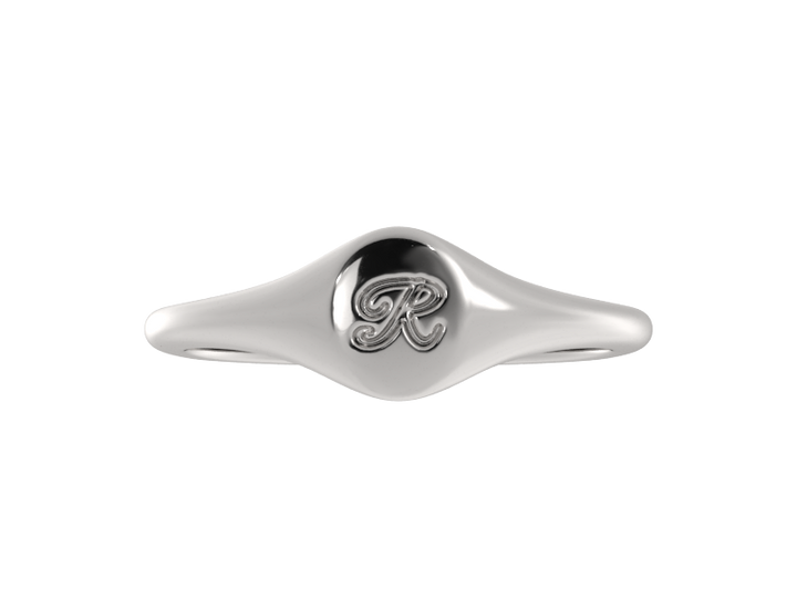 Minimalist ladies’ signet ring with custom script initial in solid gold or silver. Dainty, heirloom-quality personalized jewelry for women.