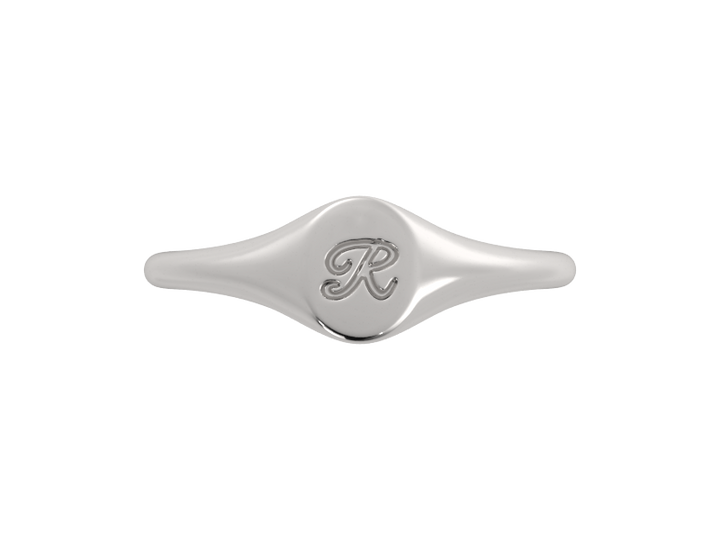 Minimalist ladies’ signet ring with custom script initial in solid gold or silver. Dainty, heirloom-quality personalized jewelry for women.