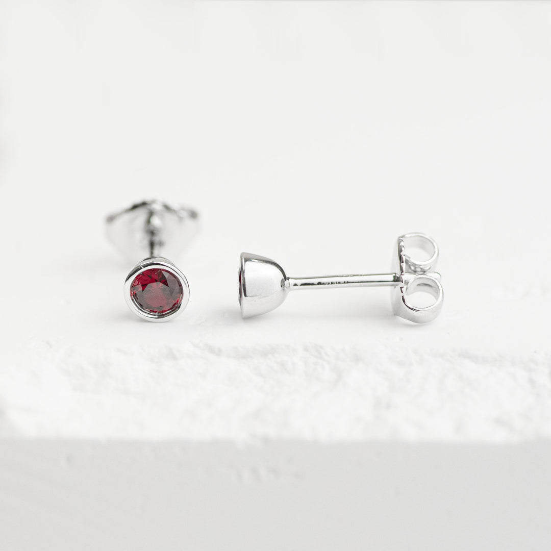 Sterling Silver Created Ruby Bezel Stud Earrings