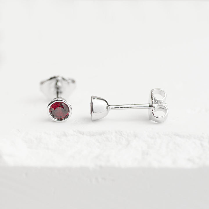 Sterling Silver Created Ruby Bezel Stud Earrings